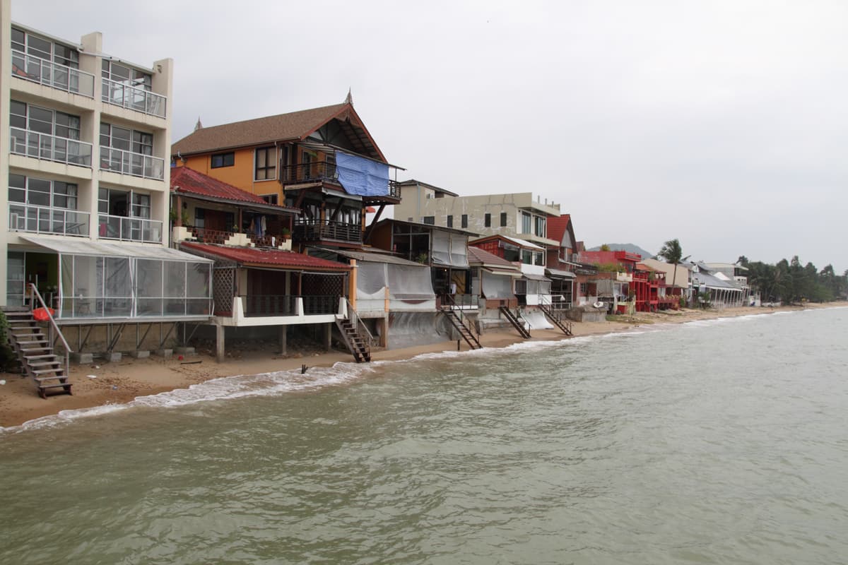 Beachfront houses and restaurants of Fisherman’s Village in Bophut seen from the water